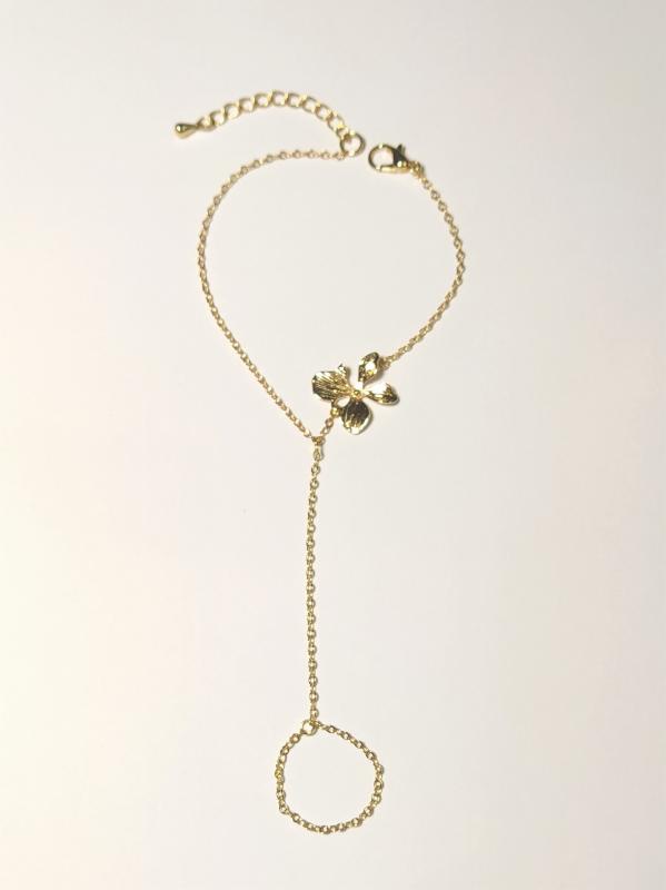 Flóra pozlátený náramok cez prst 2